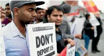  ??  ?? Indian students protest their possible deportatio­n after their visa agent in Hyderabad filed fraudulent documents without their knowledge.