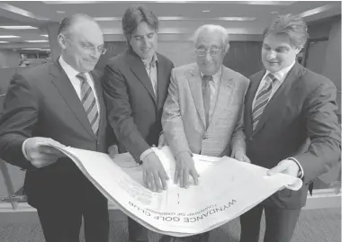  ?? PETER J. THOMPSON / NATIONAL POST ?? Empire Communitie­s chief executive Daniel Guizzetti, left, executive vice-president Paul Golini Jr.,chairman Paul Golini and chief financial officer Andrew Guizzetti at their Vaughan offices.