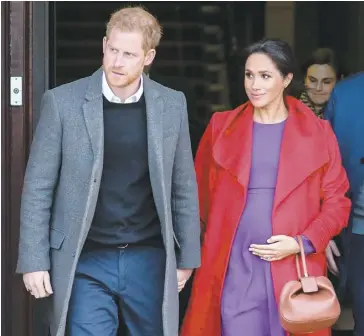  ?? PHOTO D’ARCHIVES ?? Le duc et la duchesse de Sussex, Harry Windsor et son épouse Meghan Markle, photograph­iés lors d’une sortie à Birkenhead au Royaume-Uni, l’an dernier.