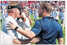  ?? [KELVIN ?? Rams head coach Sean McVay, right, greets Raiders coach Jon Gruden after their preseason game Aug. 18 in Los Angeles. KUO/THE ASSOCIATED PRESS]
