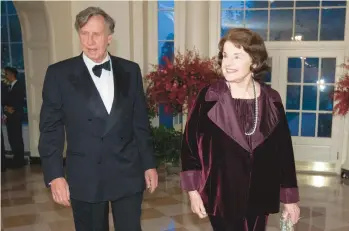  ?? CHRIS KLEPONIS/POOL PHOTO ?? Sen. Dianne Feinstein, D-Calif., and her husband, Richard Blum, arrive for a state dinner in honor of Chinese President Xi Jinping and his wife, Peng Liyuan, in September 2015 at the White House. Blum died last year.