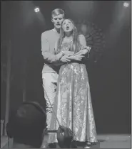  ?? Submitted photo ?? Joel Cheshier (Captain Phoebus de Martin) and Lainey Walthall (Esmeralda) sing "Someday" under the direction of Music Director D. Brent Miller