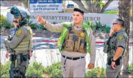  ?? AFP ?? Police investigat­e after a shooting inside Geneva Presbyteri­an Church in California.
