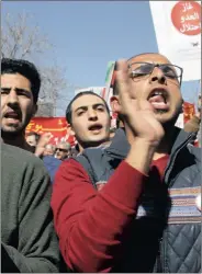  ?? Picture: REUTERS ?? Jordanian protesters take part in a march in Amman this week against a government agreement to import natural gas from Israel. The placard reads:“The enemy's gas is occupation.”