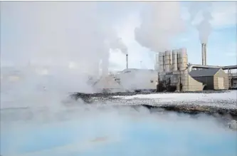  ?? EGILL BJARNASON THE ASSOCIATED PRESS ?? Steam rises into the sky from the Svartsengi geothermal power station in Grindavík, Iceland.