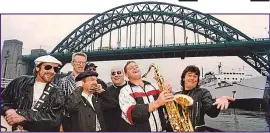  ?? Picture: ALAMY ?? Tune on the Tyne: Paul Gascoigne (holding the sax) and Lindisfarn­e promoting their 1990 hit single