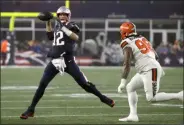  ?? ELISE AMENDOLA - THE ASSOCIATED PRESS ?? New England Patriots quarterbac­k Tom Brady, left, rolls out to pass under pressure from Cleveland Browns defensive tackle Sheldon Richardson in the second half of an NFL football game, Sunday, Oct. 27, 2019, in Foxborough, Mass.