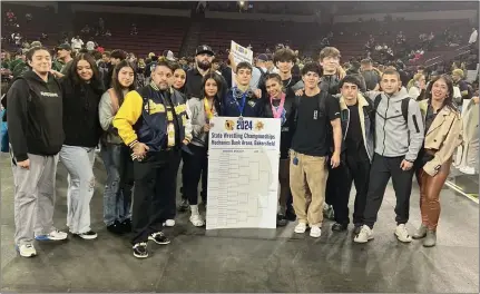  ?? PHOTO COURTESY OF BIRMINGHAM WRESTLING ?? Birmingham wrestling made history last weekend when Henry Aslikyan became the program's first CIF State individual boys champion.