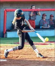  ?? TIM GODBEE / For the Calhoun Times ?? Calhoun’s Adella Carver connects for a hit during Wednesday’s series at LFO.