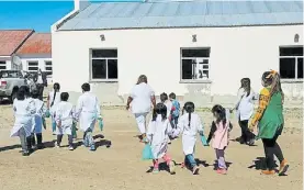  ?? ?? En primaria. Los chicos de Río Negro no iban a tener el clásico boletín.