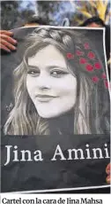 ?? James Ross / Efe ?? Cartel con la cara de Jina Mahsa Amini en un acto en Australia.