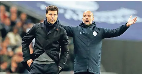  ?? FOTO: DPA ?? Ausländisc­he Arbeitskrä­fte: Manchester Citys Pep Guardiola (r.) und Mauricio Pochettino, Coach von Tottenham, stehen in England an der Seitenlini­e.