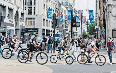  ??  ?? Popular: cycling has surged in lockdown, as has the demand for e-bikes; Simon Cowell, below, has broken part of his back