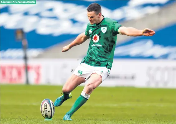  ?? JANE BARLOW/PA ?? Leading the way: captain Johnny Sexton kicks the winning penalty for Ireland at Murrayfiel­d yesterday