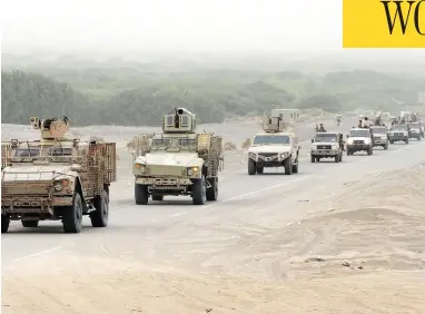  ?? NABIL HASSAN/AFP/GETTY IMAGES ?? A column of Yemeni pro-government forces and armoured vehicles arrives near Hodeidah airport on Wednesday, in an offensive that is targeting the port where most of the country’s food arrives, sparking famine concerns.