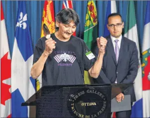  ?? AP PHOTO ?? Jerry Natanine, community leader and former mayor of Clyde River, speaks during a press conference on Parliament Hill following a ruling at the Supreme Court of Canada in Ottawa on Wednesday.