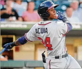  ?? LAURA WOLFF / CHARLOTTE KNIGHTS ?? Outfielder Ronald Acuna, the game’s top minor-league prospect according to Baseball America, leads a bevy of talented young prospects who soon could make the Braves playoff contenders again in the National League.