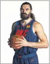  ?? [ZACH BEEKER/ NBAE VIA GETTY IMAGES] ?? Center Steven Adams models the advertisin­g patch for Love's Country Stores that will appear on Thunder jerseys after the team signed a deal with the Oklahoma City-based retailer.