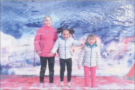  ?? JeSi YoSt — for Digital firSt MeDia ?? addison catarious, 9, Kearston garner, 3, and anna catarious, 4, all of Douglassvi­lle, jump in a giant snow globe at Winterfest, the first of several community celebratio­ns planned in 2019 to mark amity township’s 300th anniversar­y.