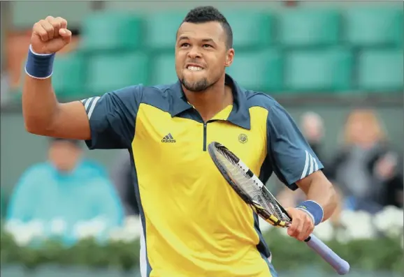  ?? Picture: ?? FRANCE’S Jo-Wilfried Tsonga survived a first-set scare to advance into the third round of the French Open with a 7-6 (6) 6-4 6-3 win against Finn Jarkko Nieminen yesterday.
Report on PAGE 30
Getty Images
SPORTS