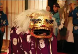  ?? COURTESY OF SHIBA PARK HOTEL ?? A shishimai lion dance performer during a New Year’s event at the Imperial Hotel Tokyo.