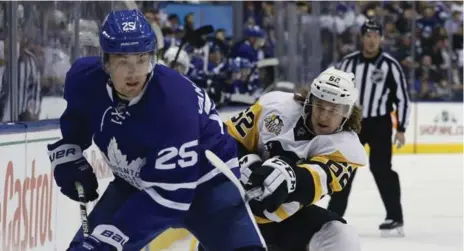  ?? RICK MADONIK/TORONTO STAR FILE PHOTO ?? Leaf James van Riemsdyk, working past Carl Hagelin of the Penguins, sits fourth in team scoring but saw his ice time plummet last time out.