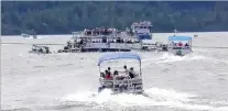  ?? PHOTO: REUTERS ?? Going down . . . A ferry sinks in the Guatape reservoir near Medellin, Colombia, yesterday in this image taken from social media.