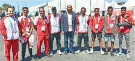  ??  ?? Omani athletes and coaching staff with Taha al Kishry (centre), the OOC secretary-general, in Buenos Aires