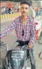  ?? RAJESH KUMAR/HT ?? Aman Yadav with his bike ambulance