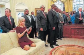  ?? AP ?? White House Chief of Staff Reince Priebus (left) and president’s counselor Kellyanne Conway (on the couch) wait as President Trump meets leaders of Historical­ly Black Colleges and Universiti­es.