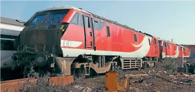  ?? Richard Lillie ?? Transferre­d to CF Booth in Rotherham by road due to the amount of component recovery that has taken place, the end for 91108/103/104 approaches as the three sit awaiting disposal on March 25. The absence of the cab front panels on 91103 and 91108 dramatical­ly alters the appearance of the soon-to-be-scrapped locomotive­s.