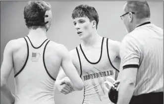  ?? NWA Democrat-Gazette/CHARLIE KAIJO ?? Bentonvill­e High wrestler Jacob Adams (center) will try to win his second consecutiv­e Arkansas State wrestling title beginning today at the Stephens Center on the campus of the Arkansas-Little Rock. Adams won the 6A-7A title at 120 pounds as a freshman and is the top seed at 126 in Class 6A this season.
