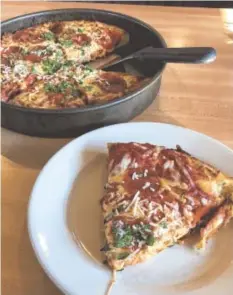  ?? PHOTO BY JIM TANNER ?? The Double Deckeroni on Chicago Thick crust at Old Chicago Pizza & Taproom at Hamilton Place is a double order of pepperoni with hot sauce and parsley.