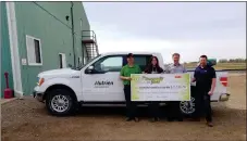  ?? Photo submitted ?? (Left to Right) Randall Egeland and Lauren Rathwell with Nutrien Ag Solutions, Curtis Gouw, a Rural Community Fund of Forty Mile Advisory Committee Member, Clayton Hodgson from FMC stand with the cheque for their FMC Clean Fields, Community Yields program donation.