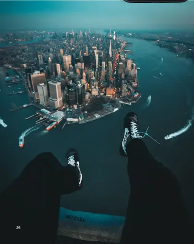  ??  ?? Below NYC HELICOPTER
FOOT DANGLE
“Hanging out of helicopter­s has to be the biggest adrenaline buzz while taking photos”