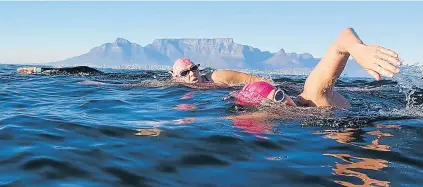  ?? Picture: SUPPLIED ?? PLAYED WITH THE SEALS: Three of the East Londoners who swam 7.5km from Robben Island to Big Bay in Cape Town on Thursday were women.