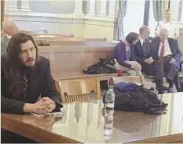  ?? APPHOTO ?? FAMILY FEUD: Michael Rotondo, left, sits during an eviction proceeding in Syracuse, N.Y., brought by his parents, Mark and Christina, of Camillus, conferring with their lawyer at right.