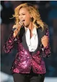  ?? MATT SAYLES/AP 2011 ?? Beyonce revealed a baby bump performing at the MTV Video Music Awards.