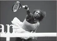  ?? ADAM HUNGER/AP ?? Serena Williams serves in her 6-0, 4-6, 6-3 win over Kaia Kanepi in the fourth round of the U.S. Open on Sunday.