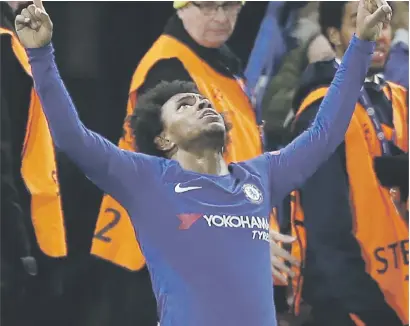  ?? Picture: AFP ?? AT LAST. Chelsea’s Willian celebrates scoring his team’s first goal during their Uefa Champions League last 16 first leg against Barcelona at Stamford Bridge last night.