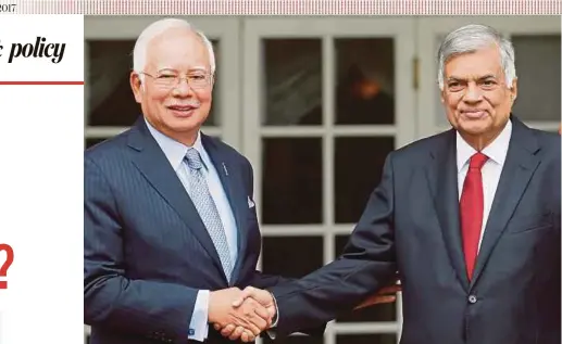  ?? REUTERS PIC ?? Prime Minister Datuk Seri Najib Razak with his Sri Lankan counterpar­t, Ranil Wickremesi­nghe, in Colombo yesterday.