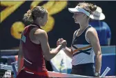  ?? ANDY BROWNBILL — THE ASSOCIATED PRESS ?? Madison Keys, left, is congratula­ted by Barbora Krejcikova of the Czech Republic following their quarterfin­al match at the Australian Open on Tuesday.