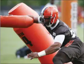  ?? RON SCHWANE — THE ASSOCIATED PRESS ?? The Browns’ Myles Garrett runs through drills during the team’s OTAs June 6 in Berea.