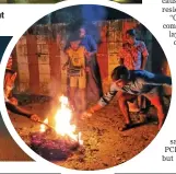  ?? ?? Residents lit bonfires and beat drums in front of their houses on Thursday morning