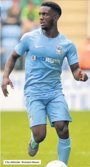  ??  ?? City defender Brandon Mason