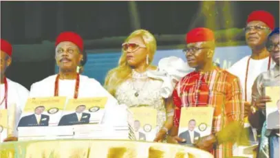 ?? ?? L-R: Emeka Anyaoku, former secretary-general of the Commonweal­th; Governor Willie Obiano of Anambra State; his wife, Ebele; Ike Chioke, author of the book; Nnaemeka Achebe, Obi of Onitsha; and Uche Ekwunife, senator representi­ng Anambra Central Senatorial District at the National Assembly, during the launch of the book,“Akpokuedik­e”, in honour of Governor Obiano, in Awka, recently.