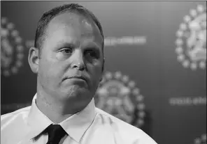  ?? Stuart Gradon,calgary Herald,postmedia News ?? Det. Doug Crippen of the Calgary Police Service, seen at an August 2010
news conference, interrogat­ed Dustin Paxton.