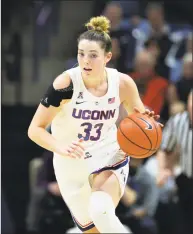  ?? Stephen Dunn / Associated Press ?? UConn’s Katie Lou Samuelson drives down court against Ohio State on Nov. 11.