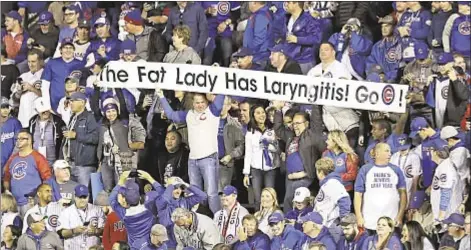  ?? GETTY ?? Fans are not ready to give up on Cubs just yet as they force Thursday’s Game 5 by beating Dodgers in Game 4 of NLCS.