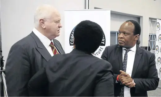  ??  ?? Jacob Zuma lawyers Mike Hellens and Muzi Sikhakhane with commission panel member Thandi Norman with her back on the camera at day one of state capture inquiry on Monday in Johannesbu­rg.